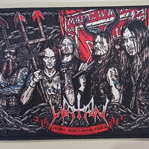 May include: Embroidered patch featuring a group of figures with long hair and dark clothing, holding weapons and a banner that reads "MUTIL WA". The patch has a black background with barbed wire and chain details.