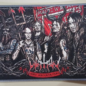 May include: Embroidered patch featuring a group of figures with long hair and dark clothing, holding weapons and a banner. The patch has a black background with a gray border and the word "SATAN" in red.