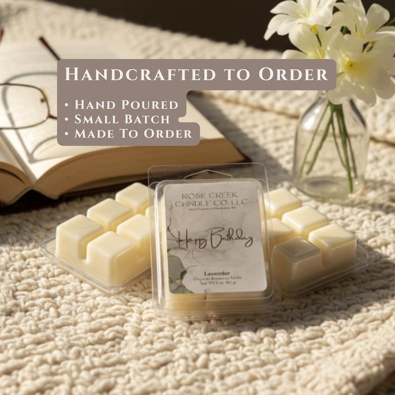 May include: Two clear plastic clamshell containers filled with off-white wax melts. The label reads Rose Creek Candle Co. LLC, Happy Birthday, and Lavender, Net Wt 3 oz. Text overlay states Handcrafted to Order, Hand Poured, Small Batch, Made to Order.