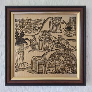 May include: A framed woodcut-style print on a tan background featuring black ink illustrations of historical scenes, including a ship at sea, a dragon, figures in period clothing, a cooking fire, and people inside a cellar with barrels.