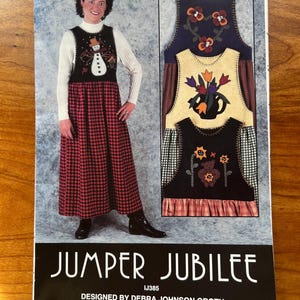 May include: A sewing pattern for a jumper with four felt appliques. The pattern is called "Jumper Jubilee" and is designed by Debra Johnson Groth. The pattern is for sizes S-XL. The pattern is from Indygo Junction, Inc.
