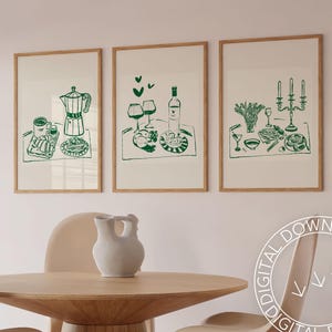 May include: Three framed illustrations of different dinner scenes. The first shows a coffee pot, a cup of coffee, and a plate of food. The second shows a bottle of wine, two glasses of wine, and a plate of food. The third shows a candle holder with two candles, two glasses of wine, and a plate of food.
