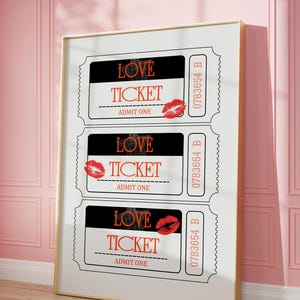 May include: Three black and white ticket-shaped prints with the text "LOVE TICKET" and "ADMIT ONE" on each. Each ticket has a red lipstick kiss mark and a ticket number.