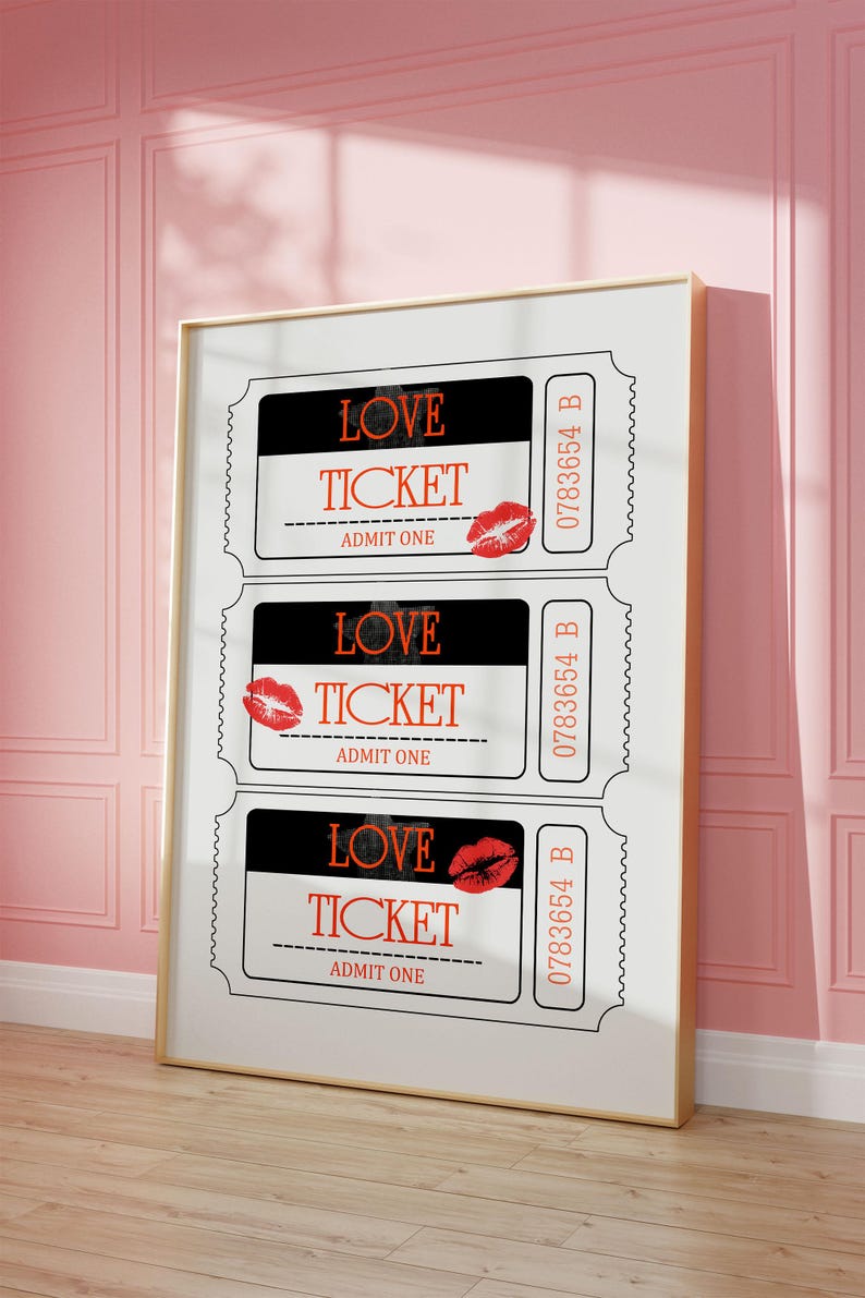 May include: Three black and white ticket-shaped prints with the text "LOVE TICKET" and "ADMIT ONE" on each. Each ticket has a red lipstick kiss mark and a ticket number.