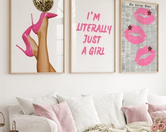 May include: Three framed wall art pieces. The first features legs wearing pink high heels balancing a leopard print ball. The second says "I'M LITERALLY JUST A GIRL" in pink. The third shows pink lips with star accents.