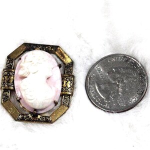 Vintage cameo brooch, pink substrate on gold colored metal
