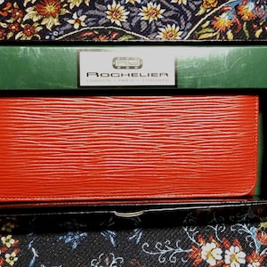 Red leather vintage Rochelier wallet, new in original box