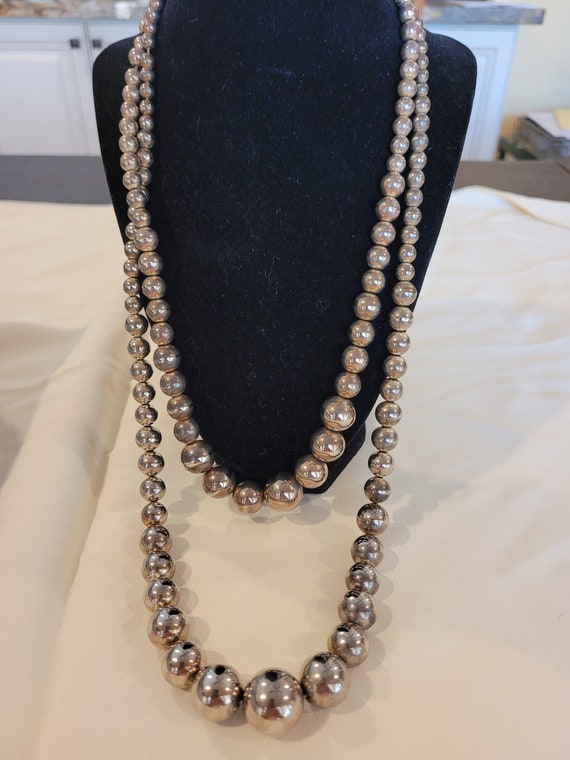 Two silver-colored beaded necklaces - image 1