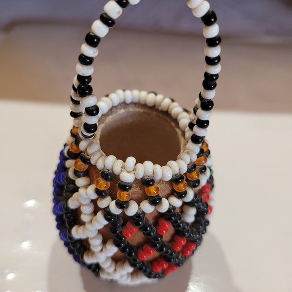 Small beaded gourd basket with bead handle