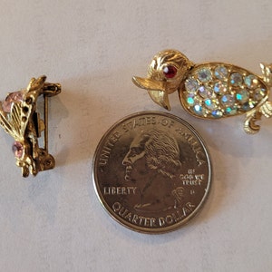 Tiny winged things - 2 crystal-studded brooches, one fly and one bird
