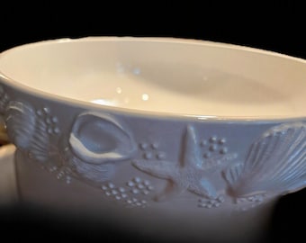 White, embossed, seashell-themed, ceramic serving bowl, Este C.E. Italy