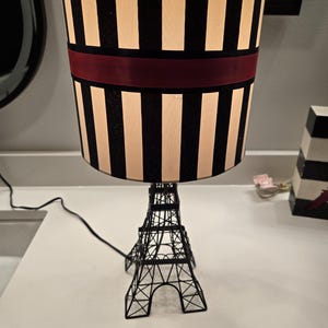 Eiffel Tower Lamp, black metal base with striped shade