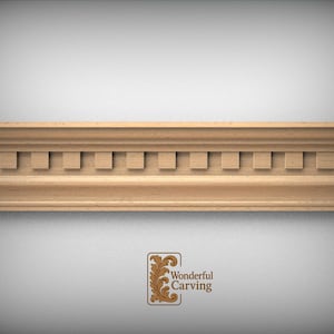 May include: A light-colored wooden molding strip featuring a horizontal row of evenly spaced square blocks set between smooth, linear profiles. The piece includes a small logo at the bottom with the text Wonderful Carving.