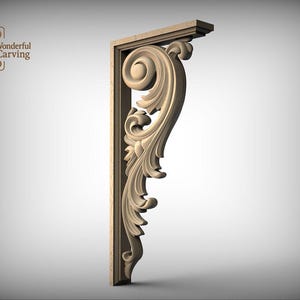 A decorative wooden bracket with an ornate, swirling design on its side, likely used for supporting or framing artwork or architectural elements.