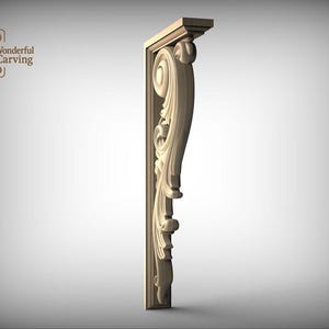 A decorative wooden bracket with an ornate, carved design on its side, standing alone against a plain background.