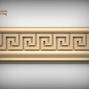 May include: A light brown wooden molding with a repeating Greek key design. The molding features a series of interlocking, square-shaped patterns. The upper left corner displays the text "Wonderful Carving".