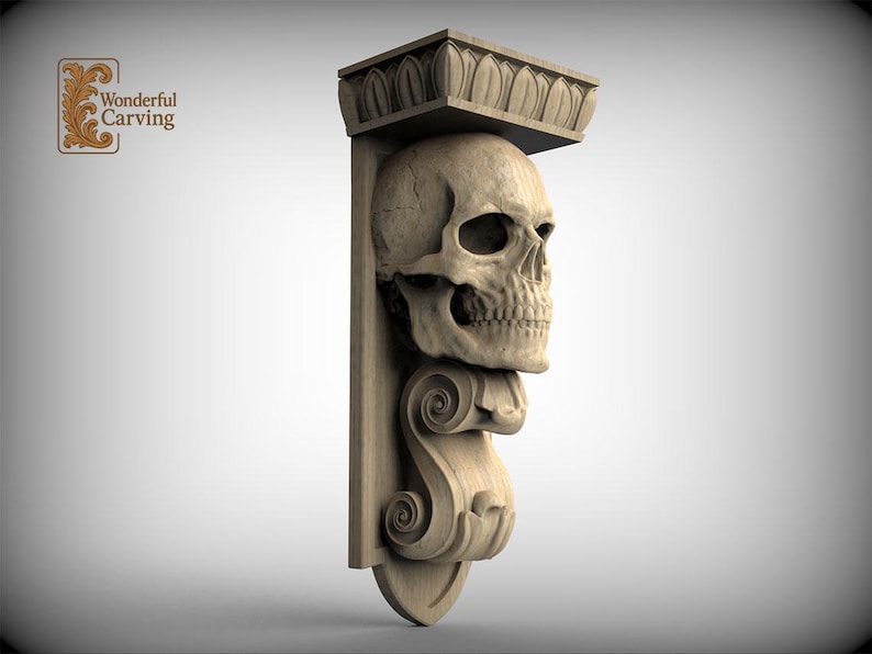 A carved wooden sculpture of a skull mounted on a wall, with an ornate decorative element above it.