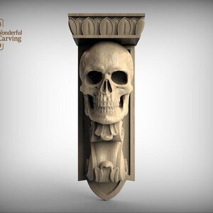 A carved wooden sculpture of a skull mounted on a wall, with a decorative design above it.