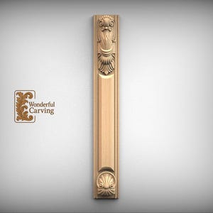 May include: A vertical light-colored wooden molding strip featuring intricate carved floral and shell-like motifs at the top and bottom ends, with a smooth rectangular panel in the center. The text Wonderful Carving is visible on the left.