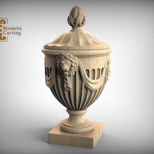 May include: A carved wooden urn with a lid, featuring a lion's head and draped fabric design. The urn is set on a square base and has vertical grooves. The text "Wonderful Carving" is in the upper left corner.