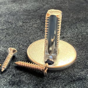 Steel dummy spindle with screws for your door or craft project. Price is per one spindle with screws.