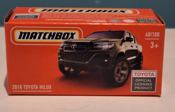 Matchbox Toyota Hilux Pickup Off Road Mountain Power Grabs - Olive Green - Collector's Edition