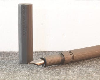 Muse Fountain Pen: An artisan ebonite pen with hand carved texturing