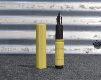 Jester Fountain Pen: A pocket sized artisan ebonite pen with hand carved texturing