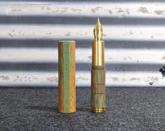Jester Fountain Pen: A pocket sized artisan ebonite pen with hand carved texturing