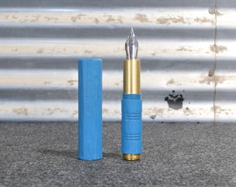 Jester Fountain Pen: A pocket sized artisan ebonite pen with hand carved texturing