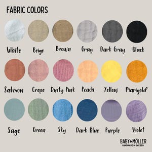 May include: A color chart displaying eighteen circular fabric swatches in various shades including white, beige, brown, gray, dark gray, black, salmon, crepe, dusty pink, peach, yellow, marigold, sage, green, sky, dark blue, purple, and violet.