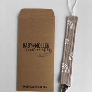 Minimalistischer, neutraler Baby-Schnullerclip für Jungen und Mädchen. Einfacher und leichter Schnullerclip aus Stoff. Ein Must-Have für das Babyregister Bild 7