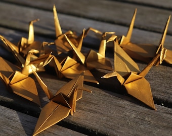 Origami Kraniche aus goldenem Papier- versch. Stückzahlen/ Packs