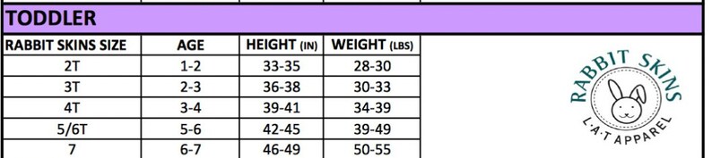 May include: A size chart for toddler apparel, featuring Rabbit Skins brand sizes. The chart lists sizes 2T through 7, with corresponding age ranges, heights in inches (33-49 in), and weights in pounds (28-55 lbs). The Rabbit Skins logo is in the corner.