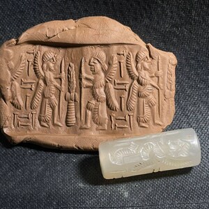 Ancient Near Eastern Agate Cylinder Seal: Winged Kings, Engraved Figures