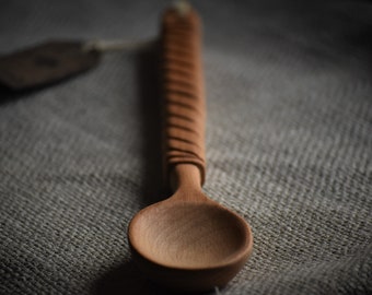 Chucharon spoon with Celtic style braid carving
