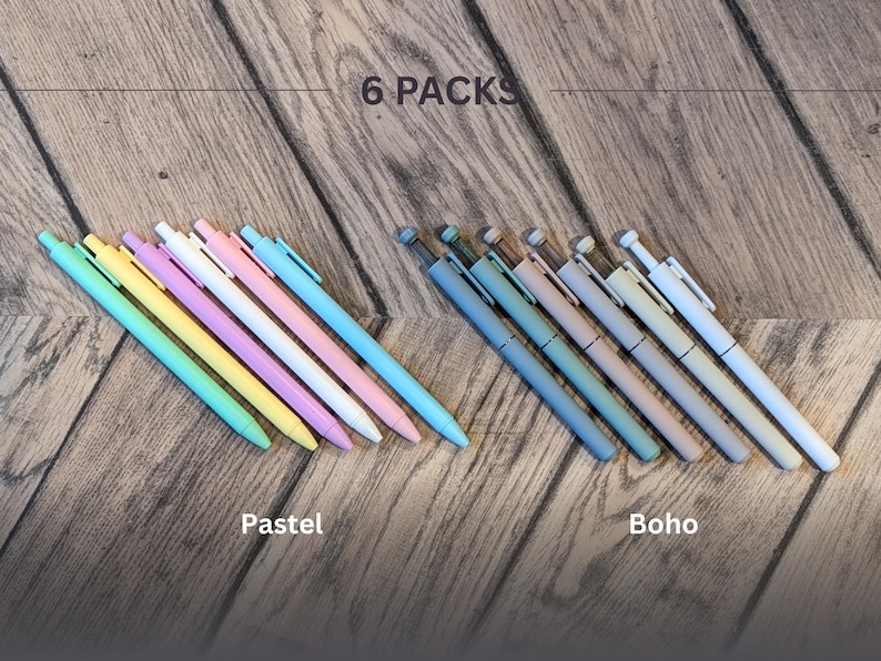 May include: Two sets of six pastel colored pens, one set in shades of blue, green, yellow, and pink, and the other set in shades of gray, beige, and brown. The text "6 PACKS" is above the pens, and the words "Pastel" and "Boho" are below the pens.