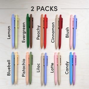 May include: Two packs of 12 pastel colored pens with names like Lemon, Evergreen, Peachy, Cinnamon, Blush, Bluebell, Pistachio, Lilac, Latte, Candy.  The pens are arranged in two rows of six.
