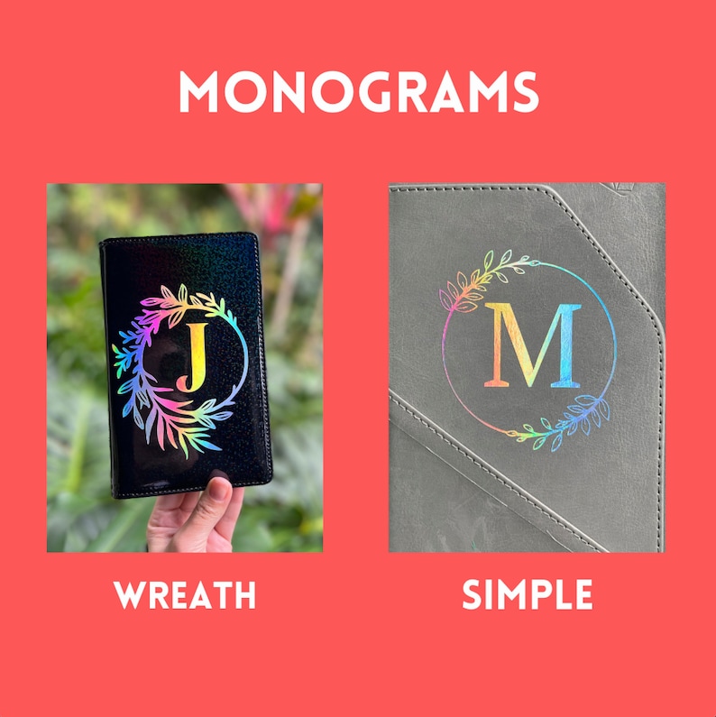 May include: Two black leather journals with different monogram styles. The first journal has a rainbow wreath with the letter "J" in the center. The second journal has a simple rainbow letter "M" in a circle.