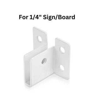 May include: White metal bracket for a 1/4 inch sign or board. The bracket has two holes on each side and a slot for the sign to fit into.