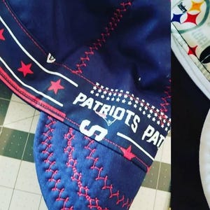 NFL Welding Cap New England Patriots. Bands vary by availability. You pick cap in coordinating team color