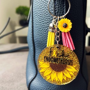 F*ck Endometrios Nyckelring | Endometriosmedvetenhetsnyckelring | Gult band solrosnyckelring | Anpassad glitter tofsnyckelring