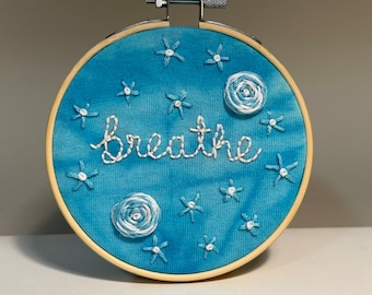 4" Embroidered Quote - “breathe” with pale blue and white flowers
