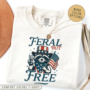 Chemise raton laveur sauvage mais gratuit Comfort Colors®, chemise raton laveur patriotique, t-shirt unisexe 4 juillet, chemise rouge blanc bleu, t-shirt raton laveur américain