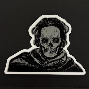 Puede incluir: Una ilustración en blanco y negro de una persona con una máscara de calavera y auriculares. La persona lleva una chaqueta con capucha.