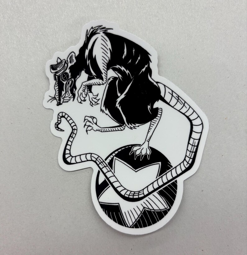 May include: Black and white sticker featuring a rat wearing a gas mask, perched atop a star-shaped design within a circle. The rat's tail curves around the star. The sticker has a white border.
