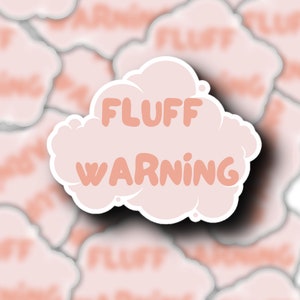 May include: Pink cloud sticker with the text "FLUFF WARNING" in a rounded, white font.