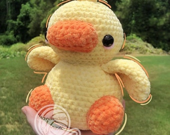 Handmade crochet sitting squishy duck plushie