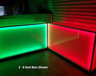 Puede incluir: Dos barras blancas de 1,80 metros de largo con luces LED. Una barra tiene luces verdes y la otra tiene luces rojas.