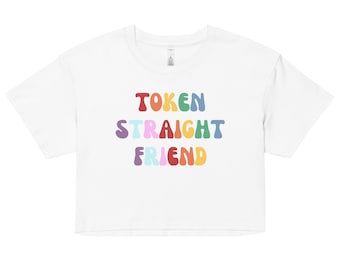 May include: White cropped t-shirt with the text "TOKEN STRAIGHT FRIEND" in rainbow colors.